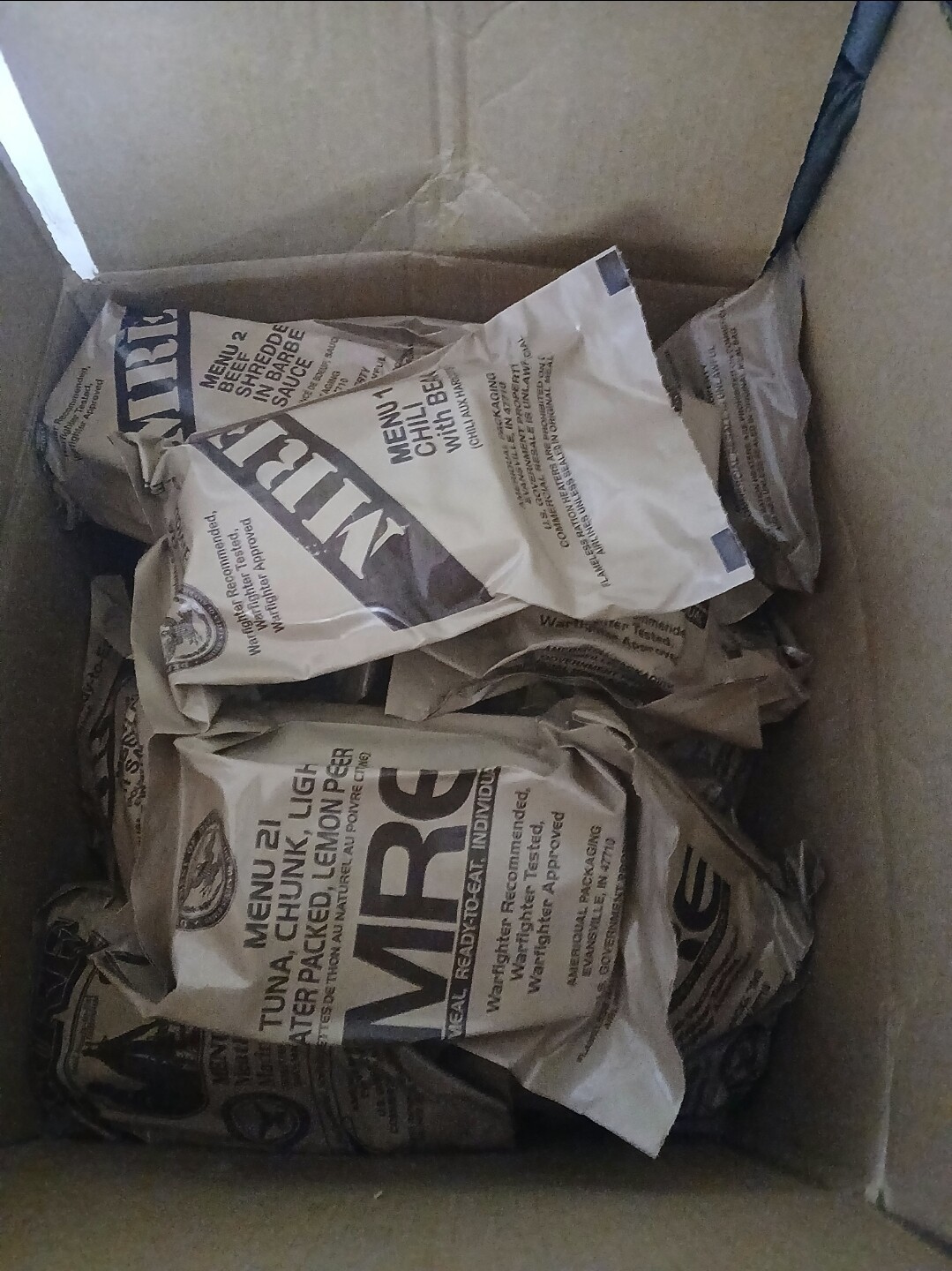 Let's get this out on a tray. Nice. Just bought a bunch of MREs to go on a diet. I'm just gonna eat one a day and stop drinking alcohol. Wish me luck guy. I'm n